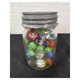 Mason Jar Containing Glass Marbles