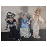 Three Porcelain Dolls with Stands