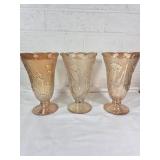 Three Orange Carnival Glass Vases