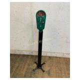 Green Coin-Operated Parking Meter on Steel Stand