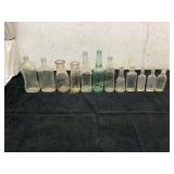 12 Assorted Glass Bottles