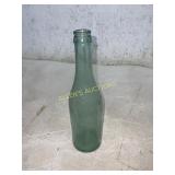 Green Glass Bottle with Embossed Lettering