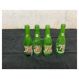 Four Vintage Green Glass 7-Up Bottles