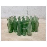 24 Embossed Coca-Cola Bottles