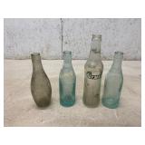 Four Vintage Glass Bottles