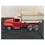 Vintage Red and White Metal Toy Dump Truck