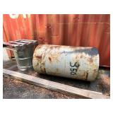 Two Large Industrial Metal Barrels