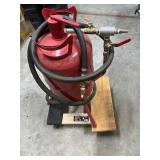 Red Central Pneumatic Sandblaster on Franklin Doll