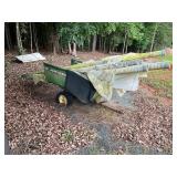 John Deere Two-Wheel Cart With Pipes
