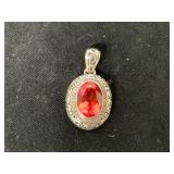 Oval Pendant with Red Stone and Silver Frame
