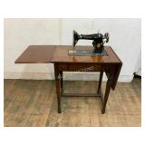 Singer Sewing Machine in Wooden Cabinet