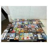 54 Assorted DVDs