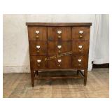 Wooden Apothecary-Style Cabinet With Nine Drawers