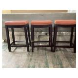 Three Faux Leather Upholstered Bar Stools