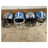 Four Vintage Youth Football Helmets