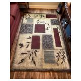 Rug with Geometric and Leaf Designs