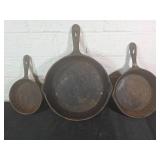 Three Cast Iron Skillets