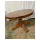 Round Wooden Pedestal Dining Table
