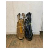 Two Golf Bags With Mixed Clubs and Covers