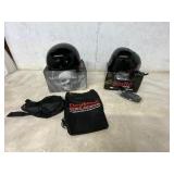 Two Black Motorcycle Helmets with Accessories