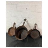 Three Cast Iron Skillets