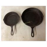Two Lodge Cast Iron Skillets