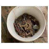 Bucket of Assorted Metal Hardware and Chains
