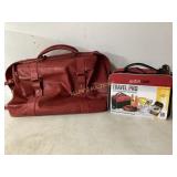 Red Faux Leather Bag and Justin Case Travel Kit
