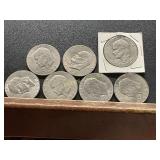 Seven Eisenhower Dollar Coins