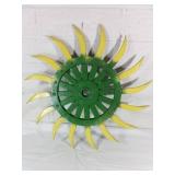Green and Yellow Metal Wheel Decor