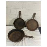 Three Cast Iron Skillets