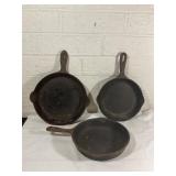Three Cast Iron Skillets