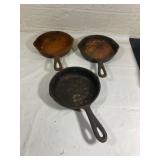 Three Cast Iron Skillets