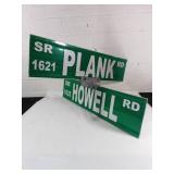 Plank Rd and Howell Rd Street Signs
