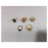 Five Gold-Tone Rings