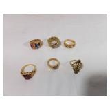 Six Gold-Tone Rings