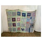 Patchwork Quilt With Striped Backing