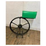 Green Mailbox on Industrial Metal Wheel Base