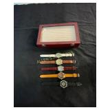 Five Wristwatches with Display Case