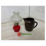 Red Glass Oil Lamp and Brown Ceramic Pitcher