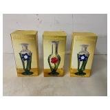 Three Glass Vases with Floral Motifs