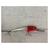 Plastic Fishing Lure with Red and White Finish