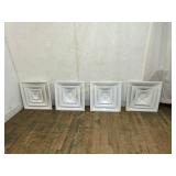 Four White Ceiling Air Vents
