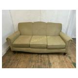 Three-Cushion Upholstered Sofa on Wooden Feet