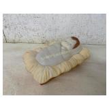 ÂFigurine of Baby on Cushion