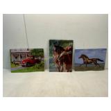 Three Embossed Metal Wall Signs