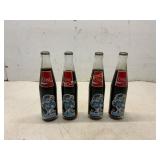 4 Coca-Cola Bottles with Commemorative Design