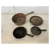 Four Assorted Cast Iron Cookware Pieces