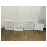 Four White Metal Vent Covers