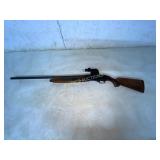 Pump-Action Shotgun with Wood Stock